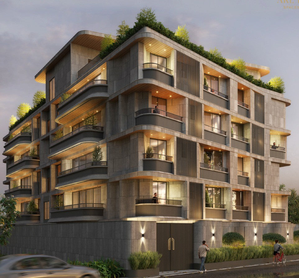 Architect reviewing detailed drawings, site plans and architectural models at The Kriya Collective